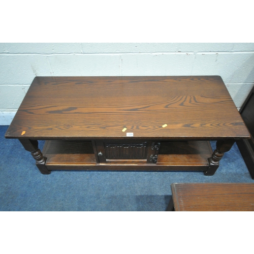 1229 - AN OLD CHARM OAK COFFEE TABLE, with a single linenfold door, width 122cm x depth 51cm x height 47cm,... 