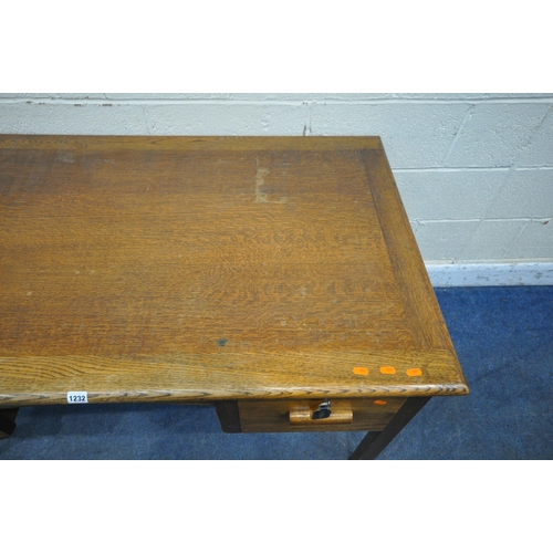 1232 - A 20TH CENTURY OAK DESK, fitted with three drawers, width 138cm x depth 77cm x height 77cm, along wi... 