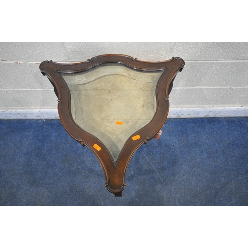 1237 - AN EDWARDIAN MAHOGANY SERPENTINE BIJOUTERIE TABLE, of a triangular form, with a hinged lid, beige ve... 