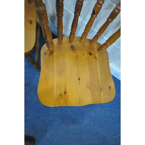 1251 - A SET OF FOUR PINE SPINDLE BACK KITCHEN CHAIRS (condition report: slight wobble to a couple of back ... 