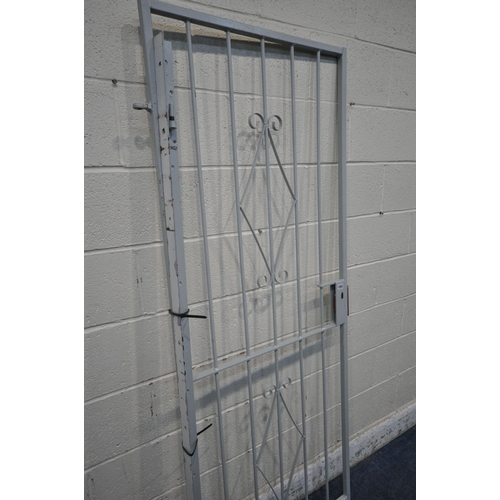 1263 - A PAINTED CAST IRON DOOR, width 83cm x height 193cm (condition report: no key, general signs of wear... 