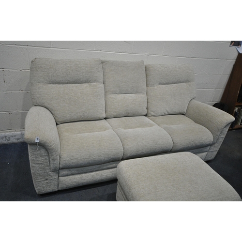 1288 - A CREAM UPHOLSTERED PARKER KNOLL THREE SEATER SOFA, length 206cm, and a matching footstool (conditio... 