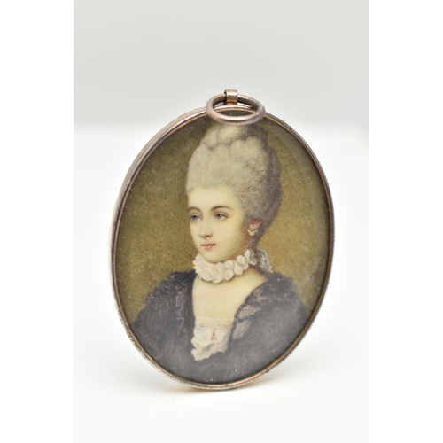 13 - A DOUBLE PHOTO LOCKET, gilt metal, of an oval form, one side depicting a lady in profile, the other ... 