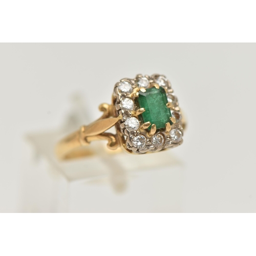 24 - A YELLOW METAL EMERALD AND DIAMOND CLUSTER RING, of a rectangular form, set to the centre with an em... 