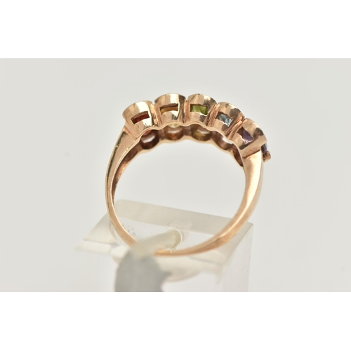 25 - A 9CT GOLD MULTI GEM SET RING, designed as a row of five oval cut stones to include garnet, citrine,... 