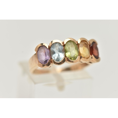 25 - A 9CT GOLD MULTI GEM SET RING, designed as a row of five oval cut stones to include garnet, citrine,... 