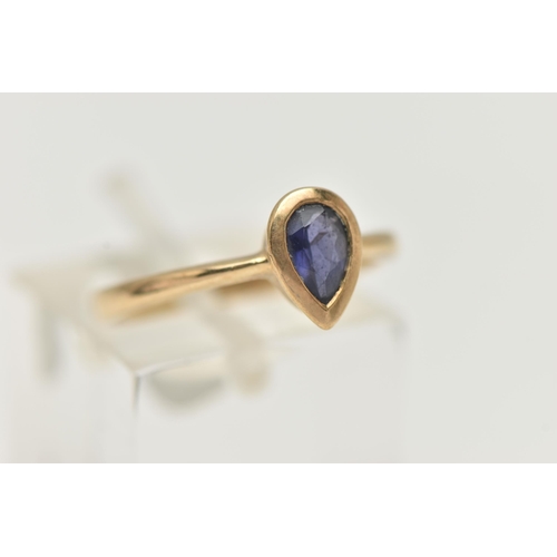 31 - A MODERN 9CT YELLOW GOLD IOLITE EARRRING, NECKLACE AND RING SET, the necklace set with a pear-cut io... 