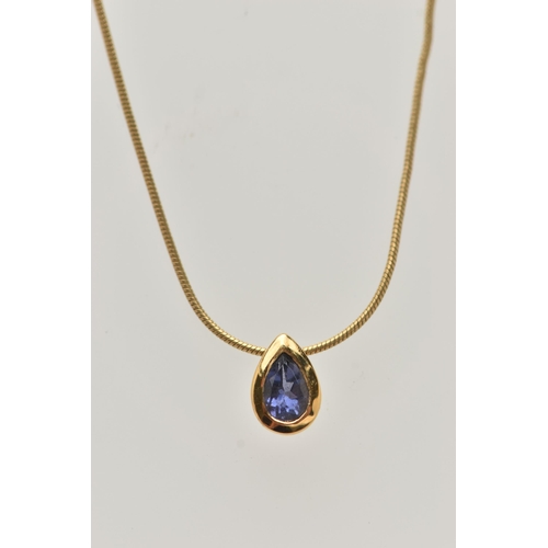 31 - A MODERN 9CT YELLOW GOLD IOLITE EARRRING, NECKLACE AND RING SET, the necklace set with a pear-cut io... 