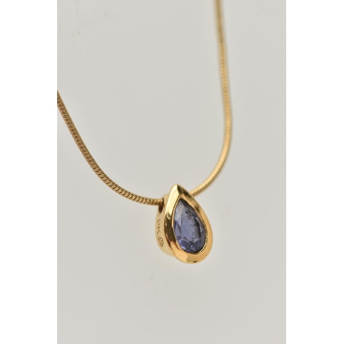 31 - A MODERN 9CT YELLOW GOLD IOLITE EARRRING, NECKLACE AND RING SET, the necklace set with a pear-cut io... 