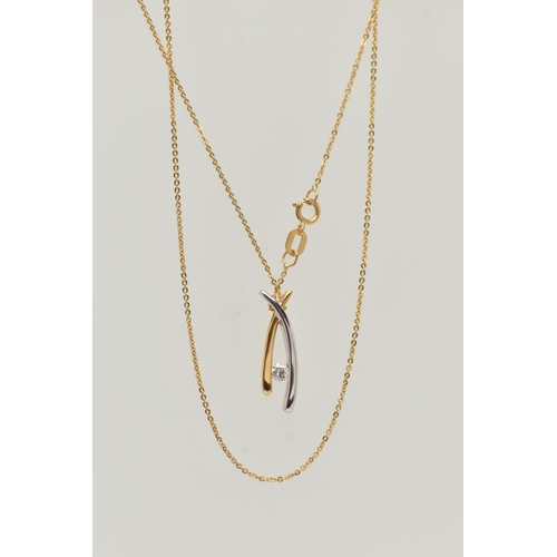 33 - A MODERN 18CT YELLOW AND WHITE GOLD DIAMOND PENDANT WITH CHAIN, the plain polished pendant of cross ... 