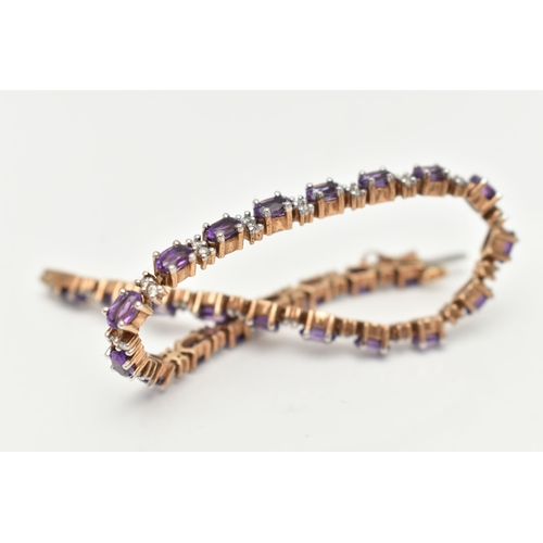 36 - A 9CT YELLOW AND WHITE GOLD AMETHYST AND DIAMOND BRACELET, designed as a series of twenty six oval s... 