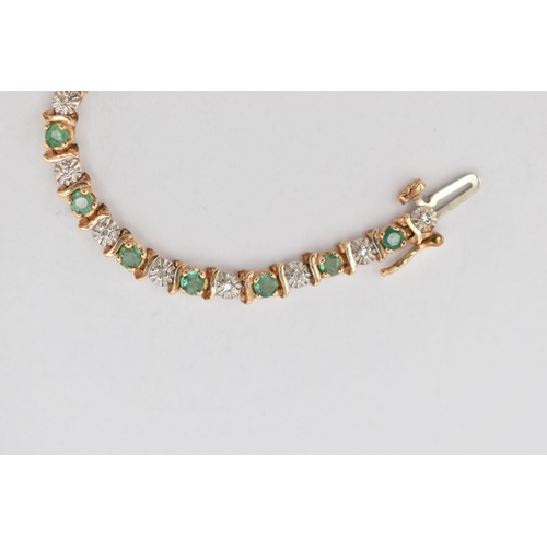 37 - A 9CT GOLD EMERALD AND DIAMOND BRACELET, designed as a series of approximately twenty four emeralds,... 