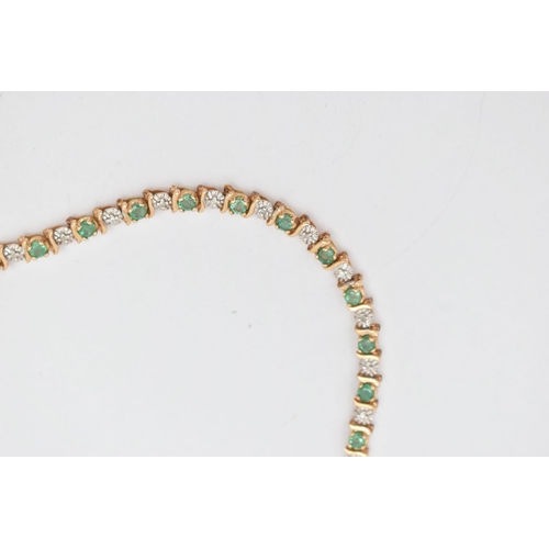 37 - A 9CT GOLD EMERALD AND DIAMOND BRACELET, designed as a series of approximately twenty four emeralds,... 