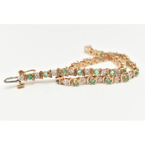 37 - A 9CT GOLD EMERALD AND DIAMOND BRACELET, designed as a series of approximately twenty four emeralds,... 