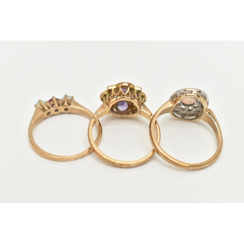 40 - THREE 9CT GOLD GEM SET RINGS, to include an opal cabochon and single cut diamond cluster ring, an am... 