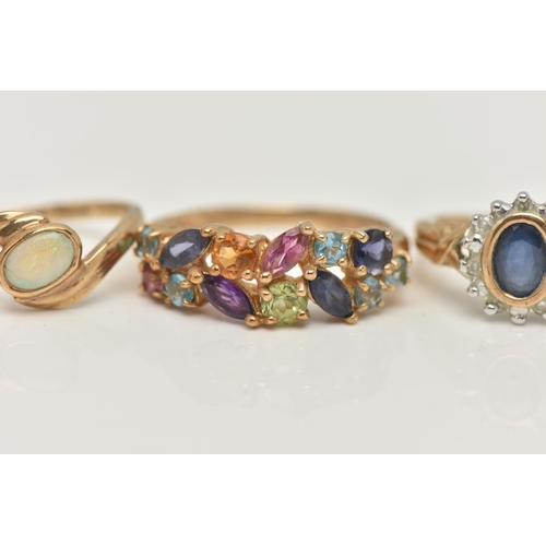 41 - AN ASSORTMENT OF GEM SET JEWELLERY, to include a 9ct yellow gold multi gem set cluster ring, hallmar... 