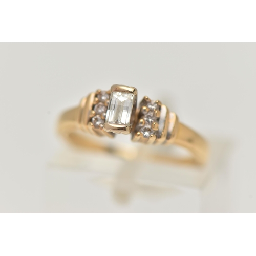 42 - AN 18CT GOLD DIAMOND RING, a baguette cut diamond, half bezel set in yellow gold, approximate diamon... 