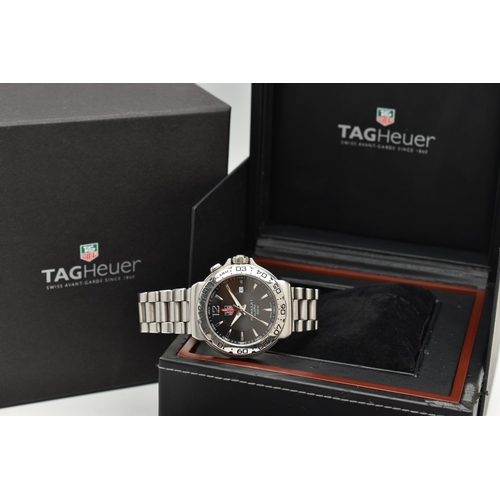 50 - A 'TAG HEUER' FORMULA 1 WRISTWATCH, quartz movement, round black dial, signed 'Tag Heuer Formula 1 A... 