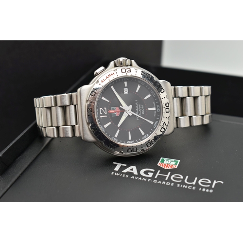 50 - A 'TAG HEUER' FORMULA 1 WRISTWATCH, quartz movement, round black dial, signed 'Tag Heuer Formula 1 A... 