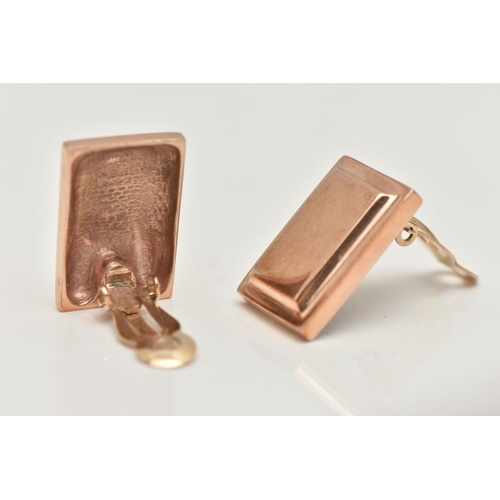 6 - A PAIR OF ROSE METAL CLIP ON EARRINGS, each of a polished rectangular form, measuring approximately ... 