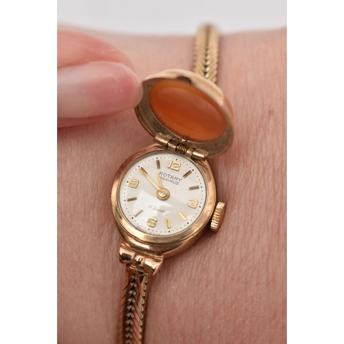 60 - A 9CT GOLD CAMEO WRISTWATCH, hand wound movement, round white dial, signed 'Rotary maximus' 21 jewel... 