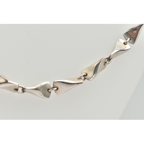 68 - A 'GEORG JENSEN' BUTTERFLY NECKLACE, a silver necklace, design number 104 A, designed by 'Edvard Kin... 