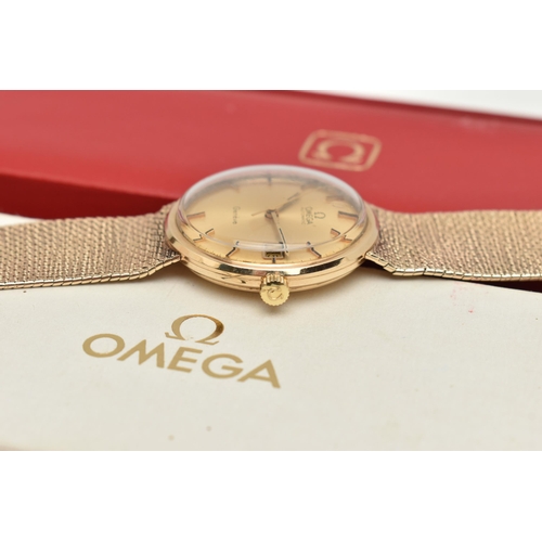 69 - A 9CT GOLD 'OMEGA' WRISTWATCH, automatic movement, round gold tone dial, signed 'Omega automatic Gen... 