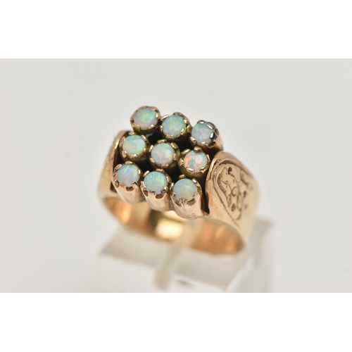 9 - A 9CT GOLD OPAL RING, large square shape ring, set with nine circular cut opal cabochons, each in a ... 