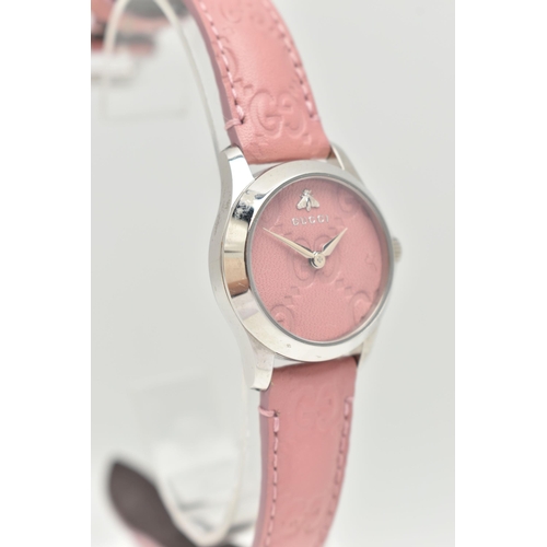 108 - A 'GUCCI G TIMELESS' WRISTWATCH, quartz movement, round pink leather dial with embossed Gucci logo, ... 