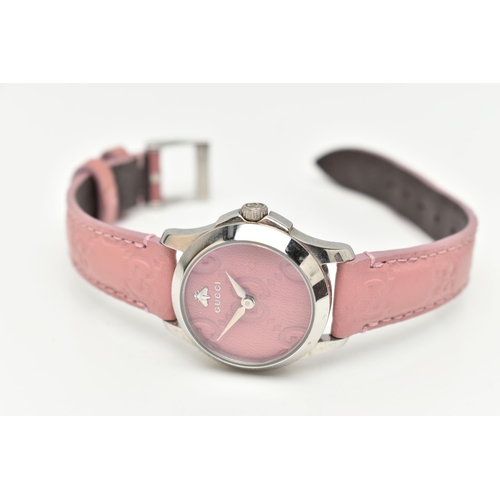 108 - A 'GUCCI G TIMELESS' WRISTWATCH, quartz movement, round pink leather dial with embossed Gucci logo, ... 