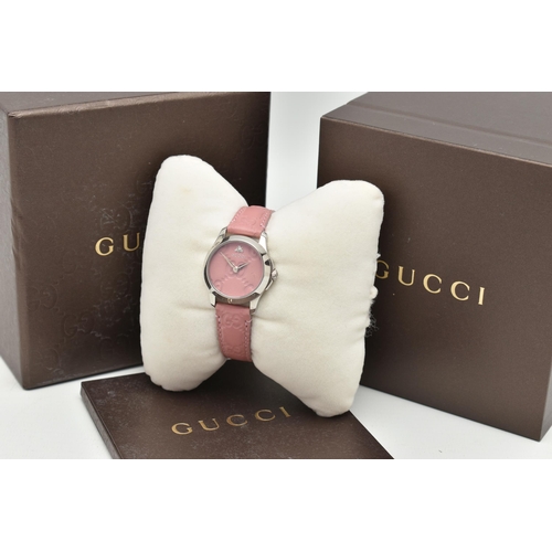 108 - A 'GUCCI G TIMELESS' WRISTWATCH, quartz movement, round pink leather dial with embossed Gucci logo, ... 