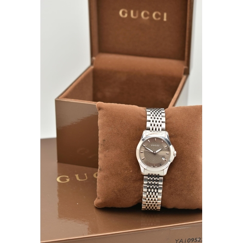 109 - A LADIES 'GUCCI G-TIMELESS' WRISTWATCH, quartz movement, round bronze dial signed 'Gucci', baton mar... 