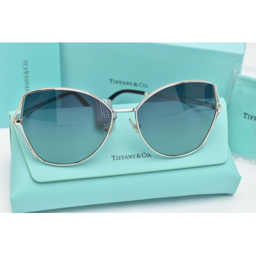 110 - A PAIR OF 'TIFFANY & CO' SUNGLASSES, a pair of butterfly style TF3072 sunglasses, together with sign... 