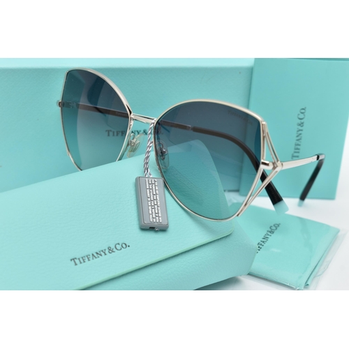 110 - A PAIR OF 'TIFFANY & CO' SUNGLASSES, a pair of butterfly style TF3072 sunglasses, together with sign... 