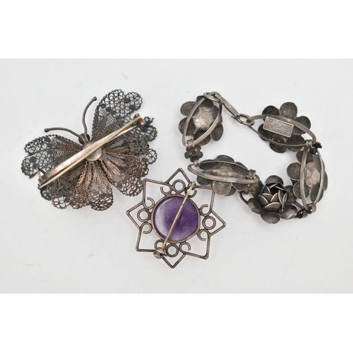 111 - THREE ITEMS OF WHITE METAL JEWELLERY, to include a white metal flower bracelet, stamped 'Sterling, C... 