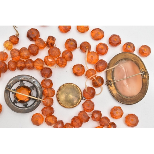 119 - A SELECTION OF LOOSE AMBER BEADS AND THREE EARLY TO MID 20TH CENTURY ITEMS, to include approximately... 