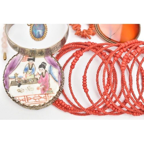 131 - A COLLECTION OF WHITE METAL CORAL, GLASS BEAD AND GEM-SET JEWELLERY, to include an expandable red gl... 