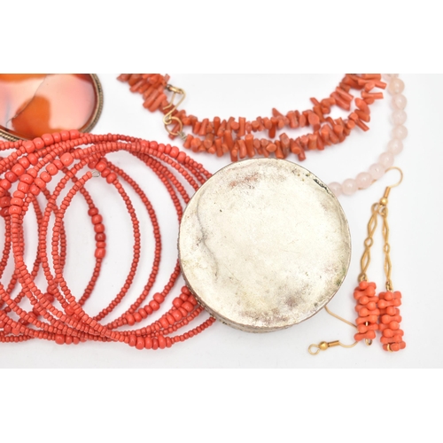 131 - A COLLECTION OF WHITE METAL CORAL, GLASS BEAD AND GEM-SET JEWELLERY, to include an expandable red gl... 