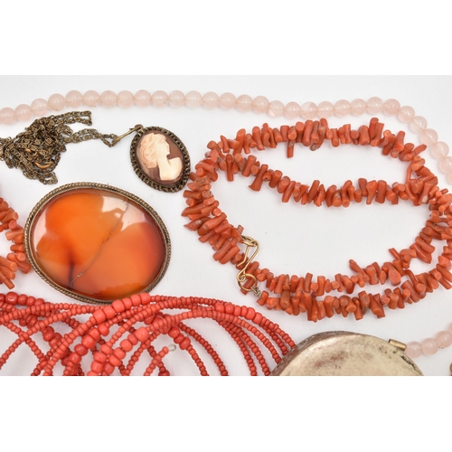 131 - A COLLECTION OF WHITE METAL CORAL, GLASS BEAD AND GEM-SET JEWELLERY, to include an expandable red gl... 