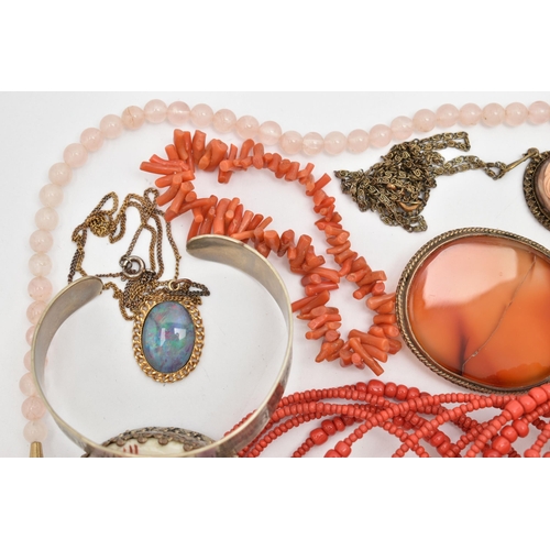 131 - A COLLECTION OF WHITE METAL CORAL, GLASS BEAD AND GEM-SET JEWELLERY, to include an expandable red gl... 