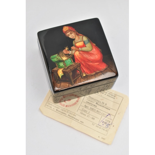 138 - A RUSSIAN BLACK LACQUER BOX, with painted scene to the hinged lid, and Russian receipt, measuring ap... 