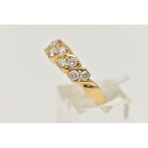 80 - AN 18CT GOLD DIAMOND RING, half eternity style set with a double row of round brilliant cut diamonds... 