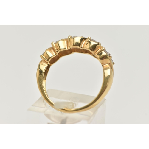 80 - AN 18CT GOLD DIAMOND RING, half eternity style set with a double row of round brilliant cut diamonds... 