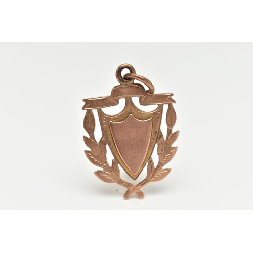 98 - A 9CT ROSE GOLD SHEILD FOB MEDAL, vacant cartouche, fitted with a jump ring for suspension, length i... 