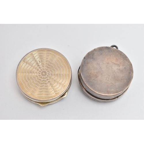 156 - AN EARLY 20TH CENTURY SILVER MINIATURE COMPACT AND PILL BOX, both of circular outline, the miniature... 