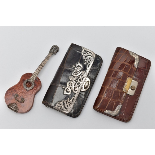 161 - TWO SILVER MOUNTED PURSES AND A MINITURE GUITAR, the first a black croc purse with floral silver mou... 