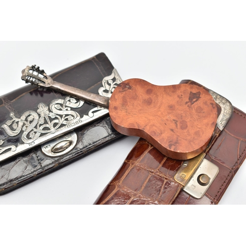 161 - TWO SILVER MOUNTED PURSES AND A MINITURE GUITAR, the first a black croc purse with floral silver mou... 