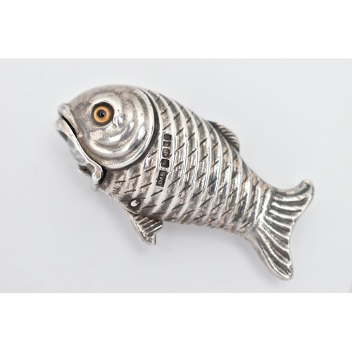 162 - A ELIZABETH II NOVELTY SILVER VESTA CASE, designed as a fish with a spring action lower mouth and gl... 