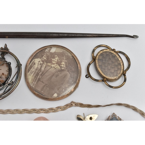 165 - A SELECTION OF SILVER AND WHITE METAL ITEMS, to include a large silver handled button hook, hallmark... 