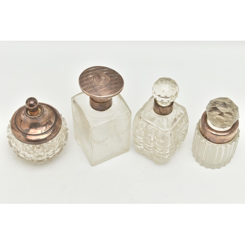 177 - FOUR SILVER TOPPED GLASS JARS, glass scent bottle with stopper and silver collar, hallmarked London,... 